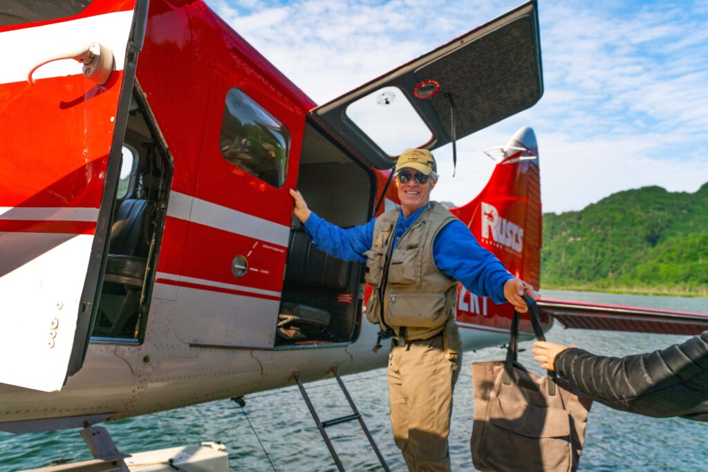 Pilot Mark Stadsklev unloads De Havilland Beaver N232KT
