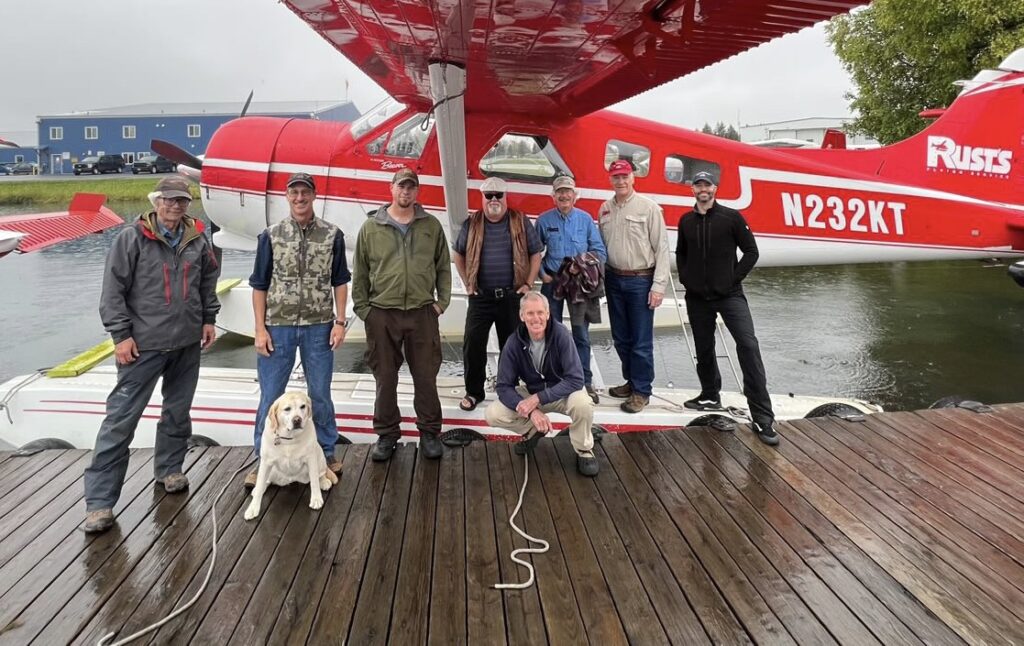 Rust's Flying Service pilots in front of N232Kt